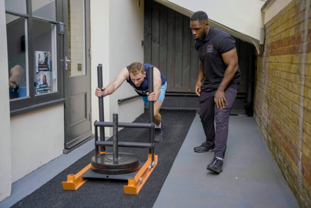 Strength Training in Islington | Personal Training That Delivers Results 4 Personal Trainer- Sled Push Islington
