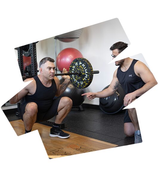 Personal trainer in London Islington man squat